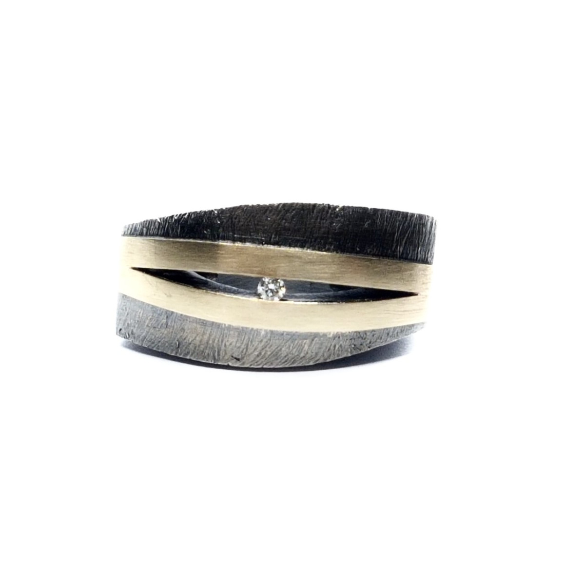 Anillo de plata y oro con diamante