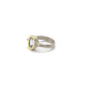 Anillo de plata y oro amarillo con diamantes y topacio azul