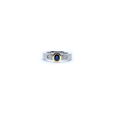 Anillo de plata y oro amarillo con diamantes y zafiro