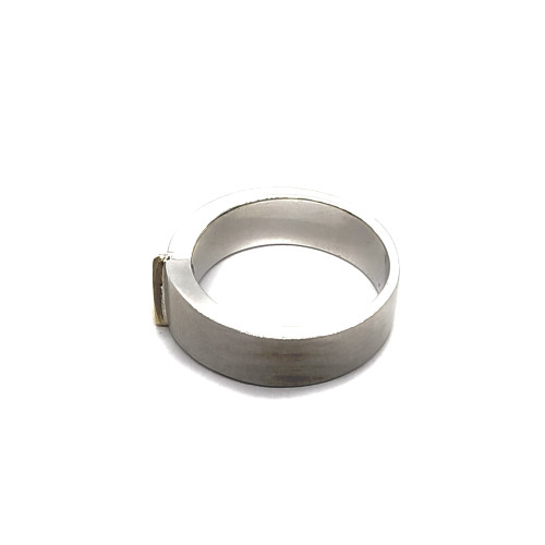 Anillo de plata y oro amarillo con diamante