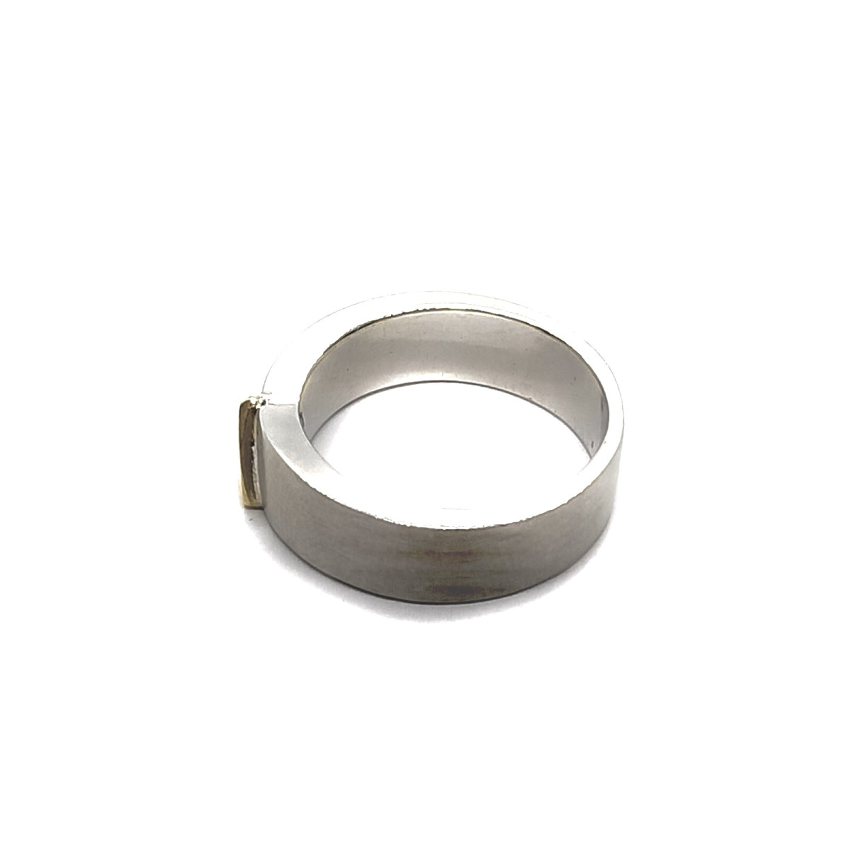 Anillo de plata y oro amarillo con diamante