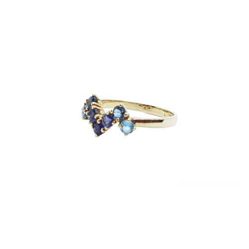 Anillo de oro amarillo con iolitas y topacios azules