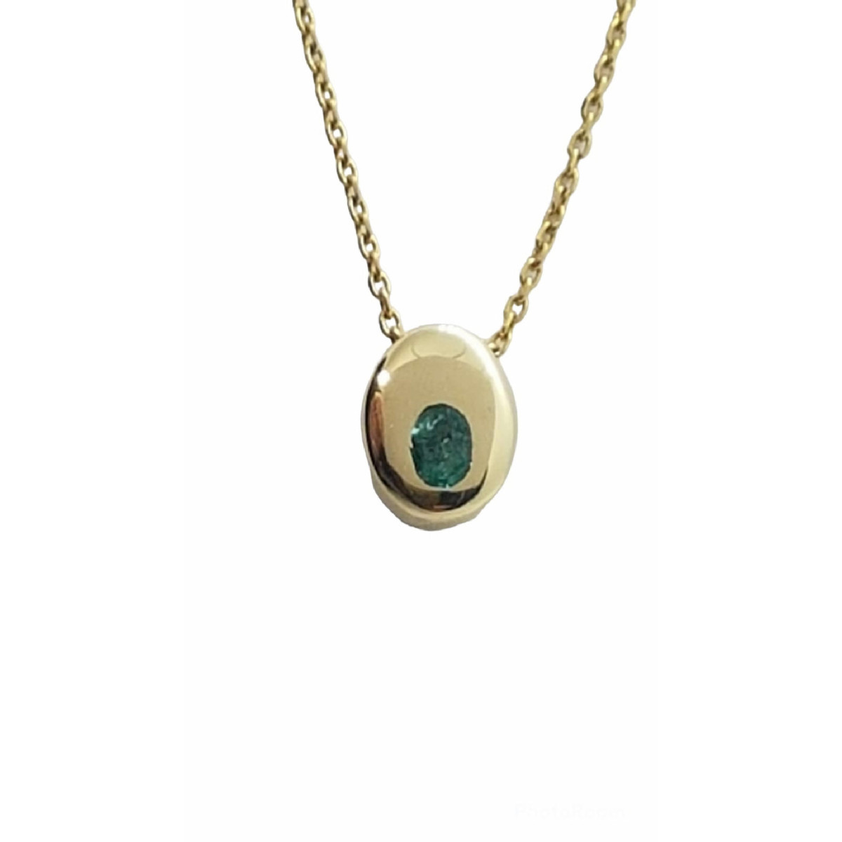Colgante de oro amarillo con esmeralda
