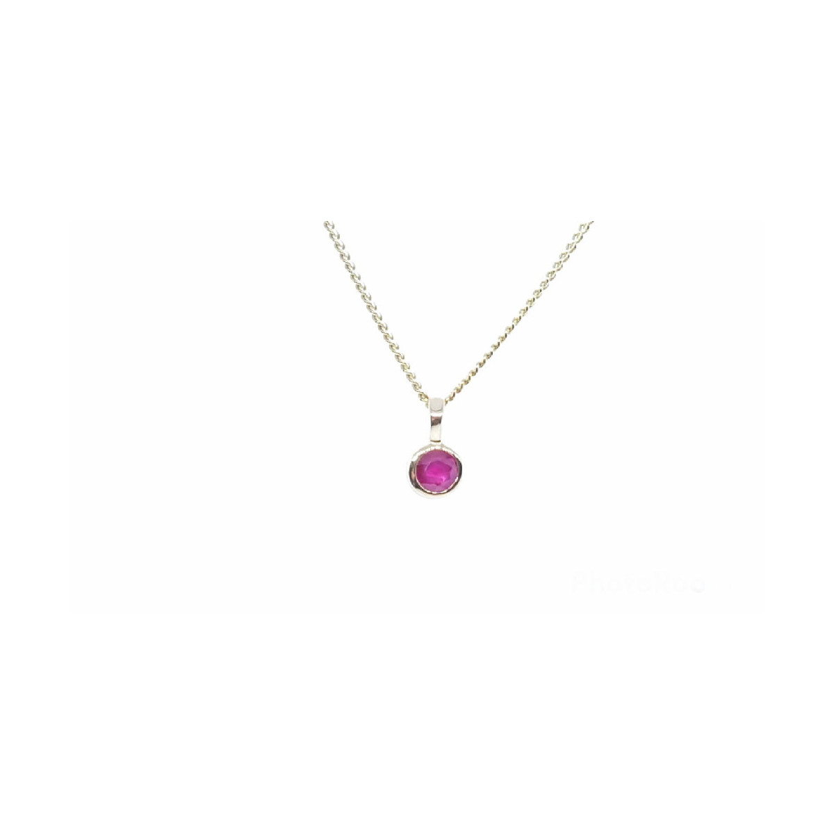 Colgante de oro amarillo con rubí
