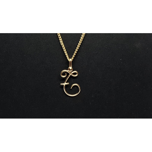 Colgante de oro amarillo - letra E