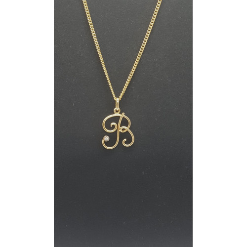 Colgante de oro amarillo con diamante - letra B