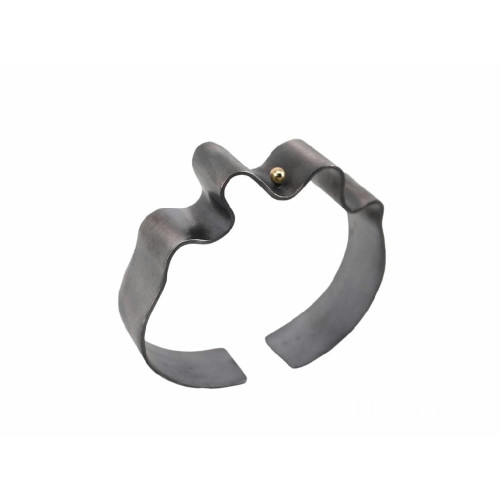 Brazalete rígido de plata y oro