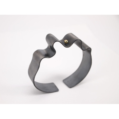 Brazalete rígido de plata y oro