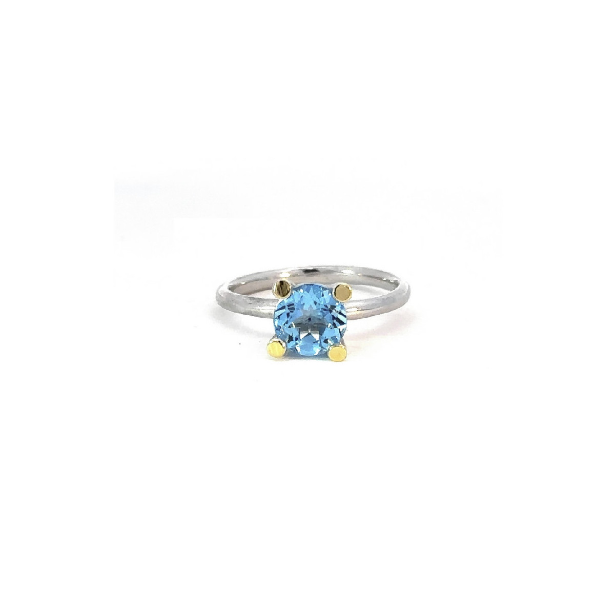 Anillo de plata y oro con topacio