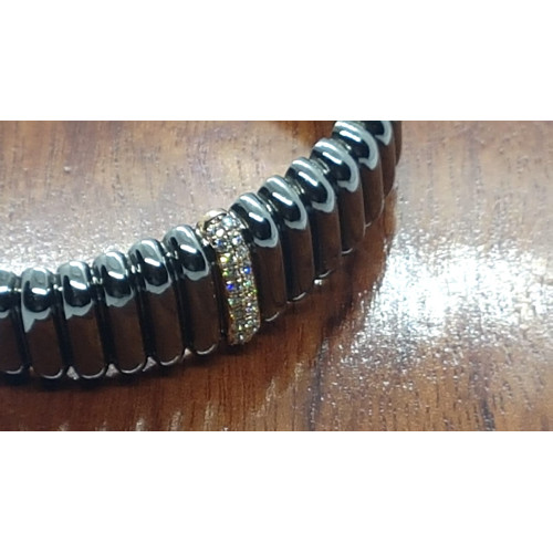 BRAZALETE RÍGIDO DE ORO AMARILLO CON DIAMANTES Y PLATA