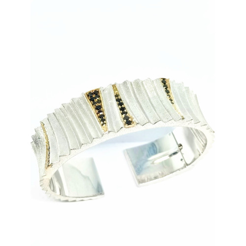 BRAZALETE RÍGIDO DE ORO AMARILLO CON DIAMANTES NEGROS Y PLATA