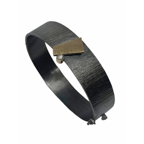 Brazalete rígido de plata, oro y diamante