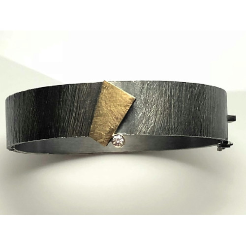 Brazalete rígido de plata, oro y diamante