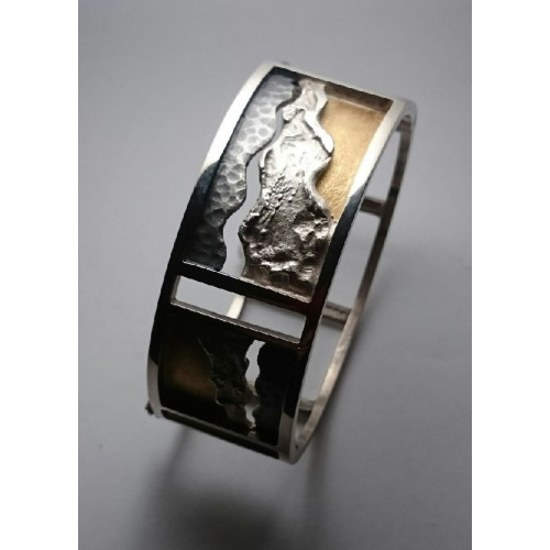 Brazalete rígido de plata y oro