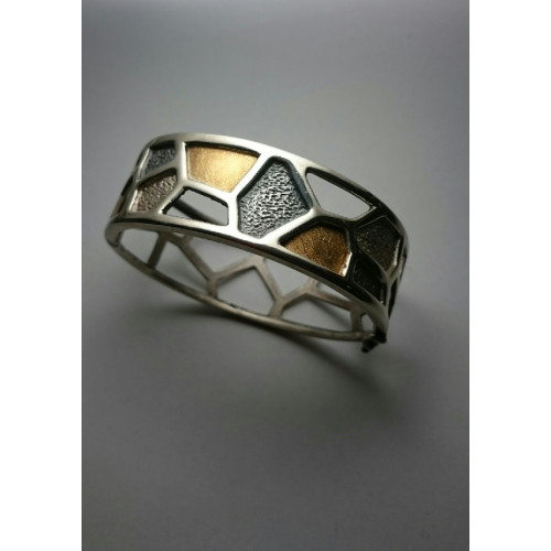 Brazalete rígido de plata y oro