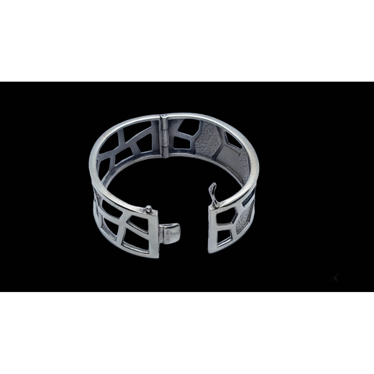 Brazalete rígido de plata y oro