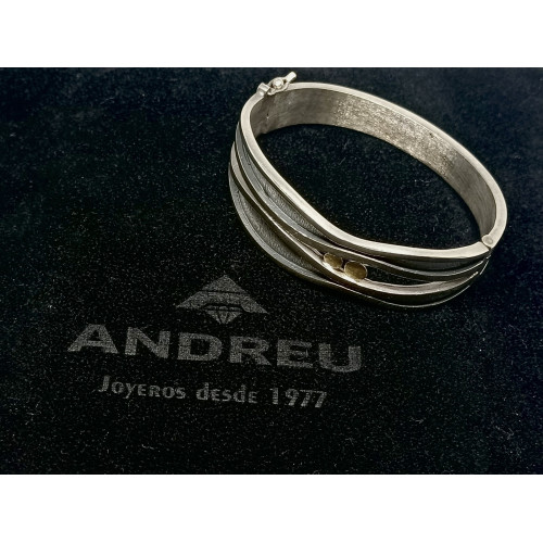Brazalete rígido de plata y oro