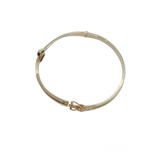 BRAZALETE RÍGIDO DE ORO AMARILLO CON DIAMANTES