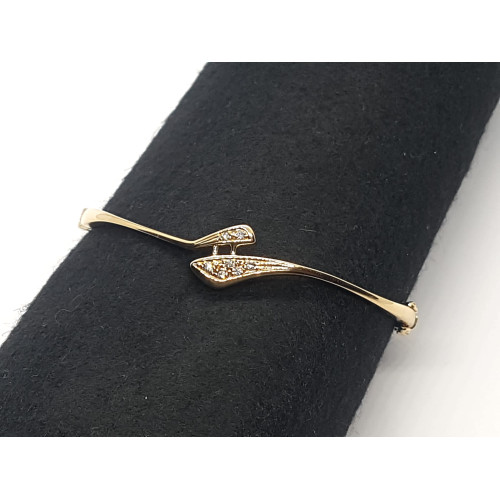 BRAZALETE RÍGIDO DE ORO AMARILLO CON DIAMANTES