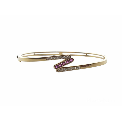 BRAZALETE RÍGIDO DE ORO AMARILLO CON DIAMANTES Y RUBÍES