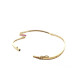 BRAZALETE RÍGIDO DE ORO AMARILLO CON DIAMANTES Y RUBÍES