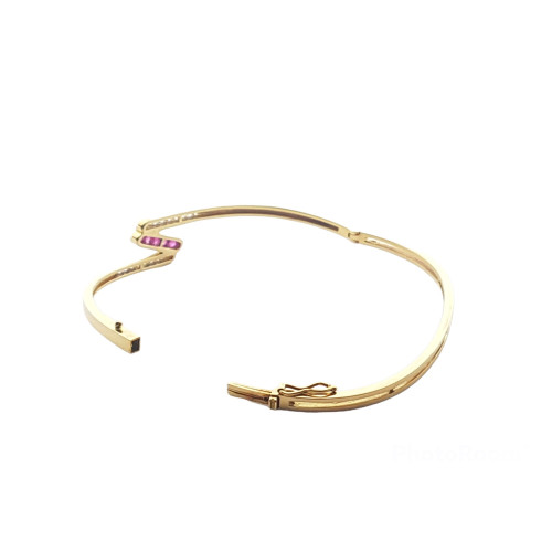 BRAZALETE RÍGIDO DE ORO AMARILLO CON DIAMANTES Y RUBÍES