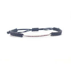 Pulsera estilo Rivière de oro blanco y rubíes