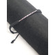 Pulsera estilo Rivière de oro blanco y rubíes