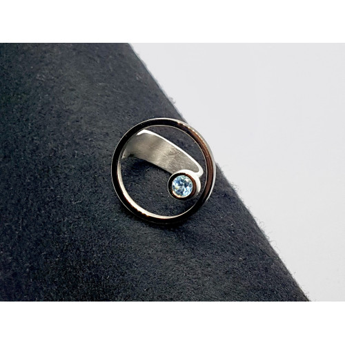 Anillo de plata y oro  con topacio azul