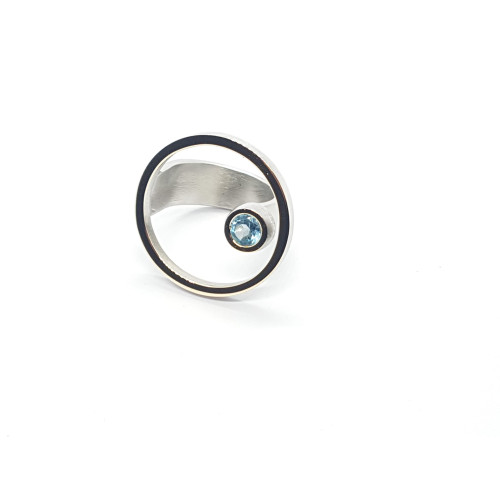 Anillo de plata y oro  con topacio azul