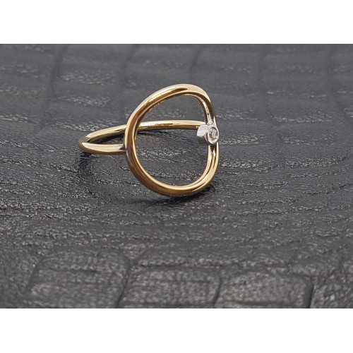 Anillo combinado con oro amarillo y oro blanco con diamante