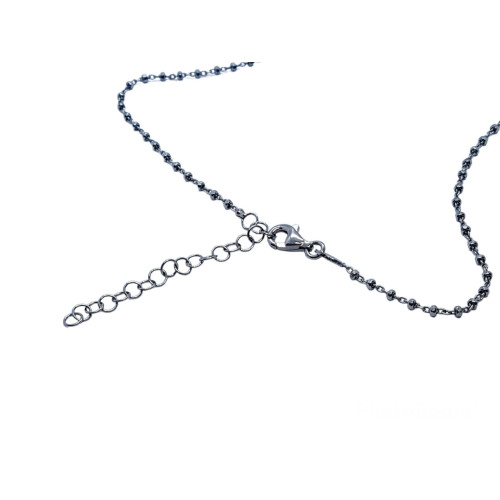 Collar de plata con forma de cruz y circonitas