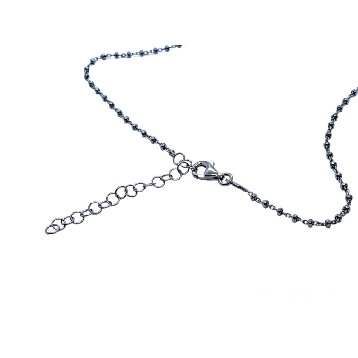 Collar de plata con forma de cruz y circonitas
