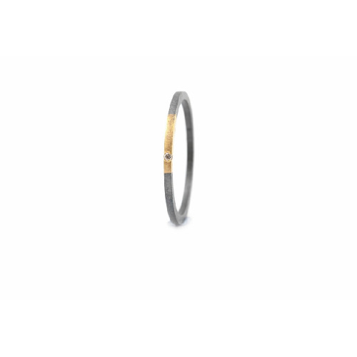 Anillo de plata y oro con diamante