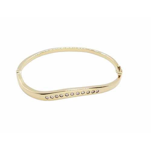 BRAZALETE RÍGIDO DE ORO AMARILLO CON DIAMANTES