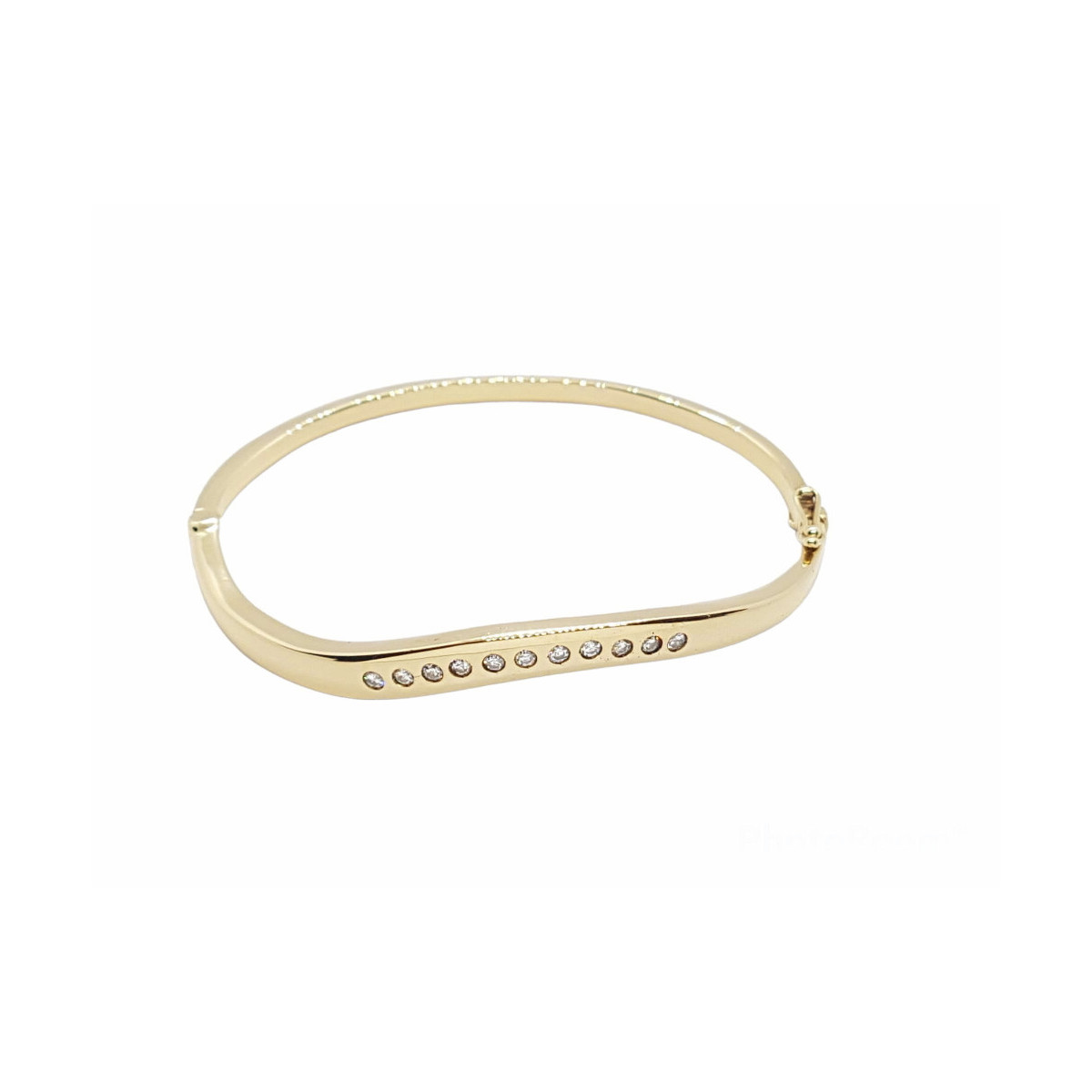 BRAZALETE RÍGIDO DE ORO AMARILLO CON DIAMANTES