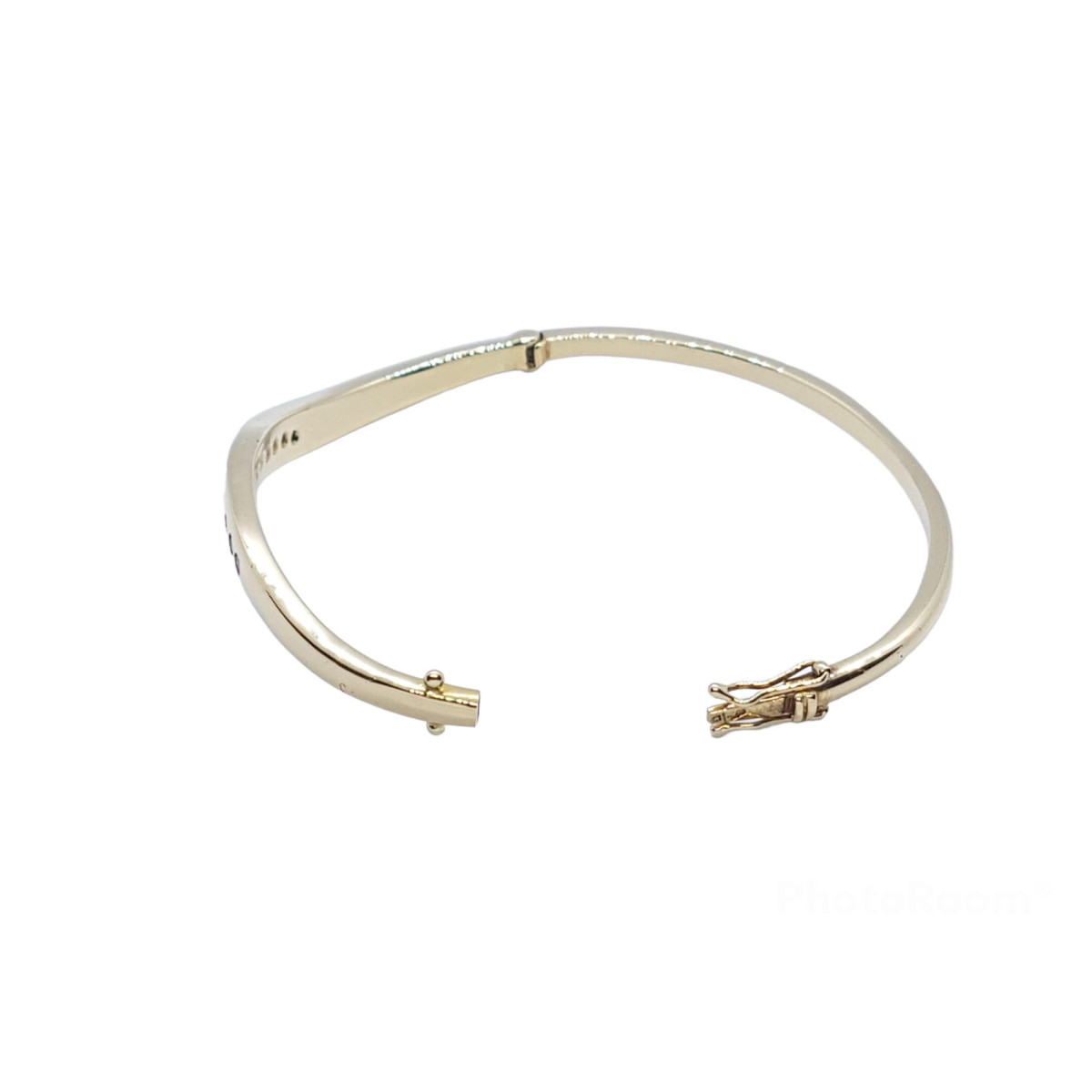 BRAZALETE RÍGIDO DE ORO AMARILLO CON DIAMANTES