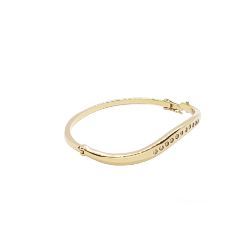 BRAZALETE RÍGIDO DE ORO AMARILLO CON DIAMANTES