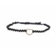 Pulsera de macramé con un corazón de oro