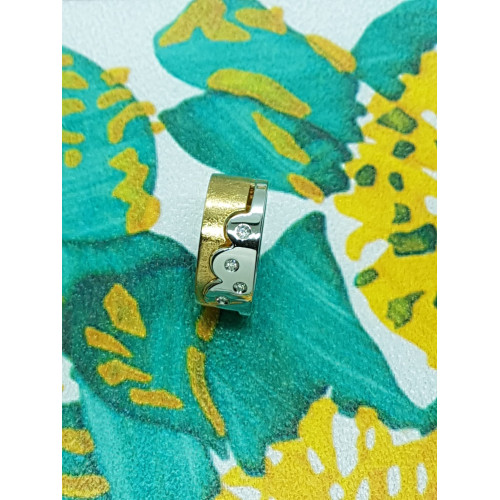 Anillo de oro blanco y oro amarillo con diamantes
